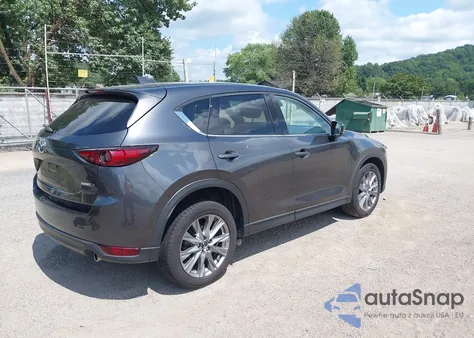 2021 Mazda Cx-5 Grand Touring z USA, uszkodzony, nr VIN JM3KFBDM0M1421482